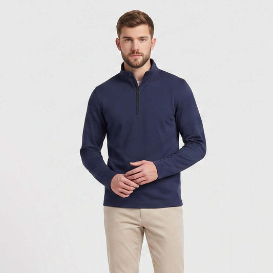 Male model wearing Navy blue All-Season Q-Zip Pullover, minimalist blank apparel for custom branding