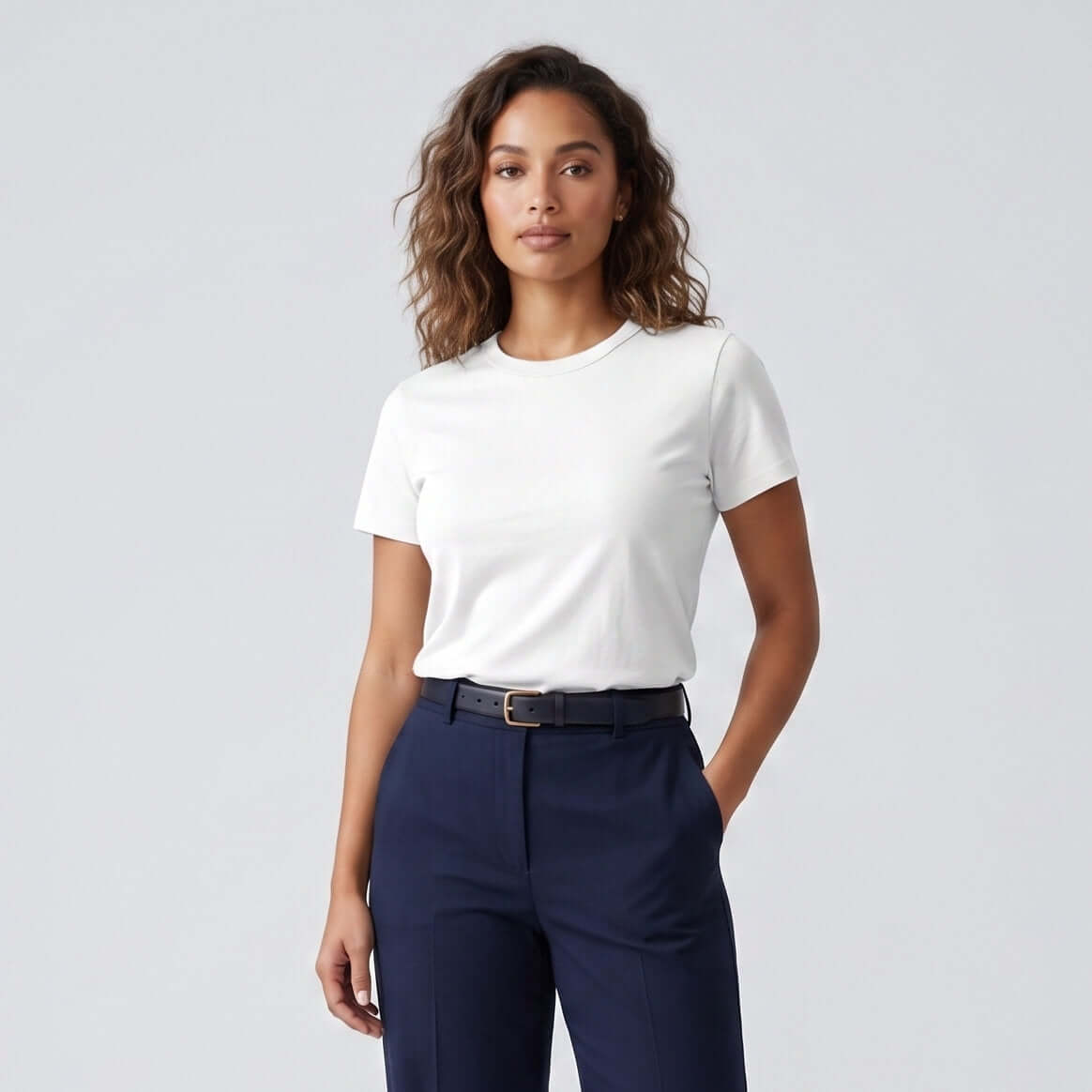 Female model wearing Optical White Engineered Performance Tee, high-quality blank cotton t-shirt for custom print