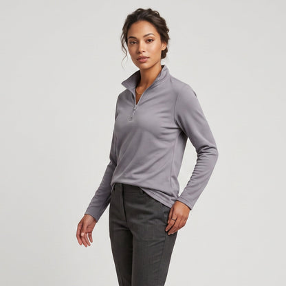 Female model wearing Iron Gray All-Season Q-Zip Pullover, minimalist blank apparel for custom branding
