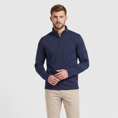 Male model wearing Navy blue All-Season Q-Zip Pullover, minimalist blank apparel for custom branding
