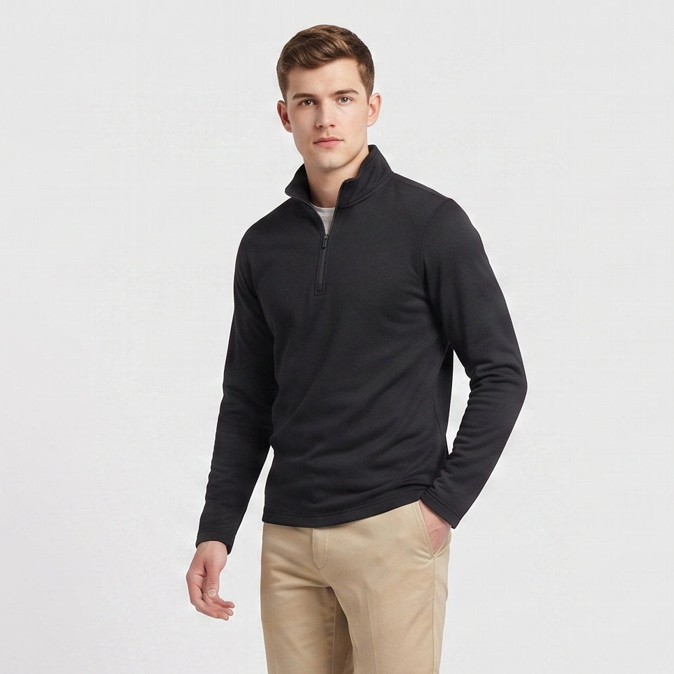 Male model wearing Obsidian Black All-Season Q-Zip Pullover, minimalist blank apparel for custom branding