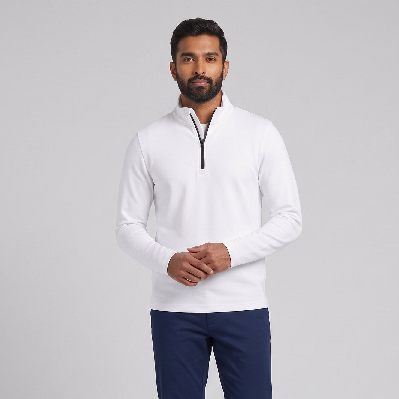 Male model wearing Optical White All-Season Q-Zip Pullover, minimalist blank apparel for custom branding