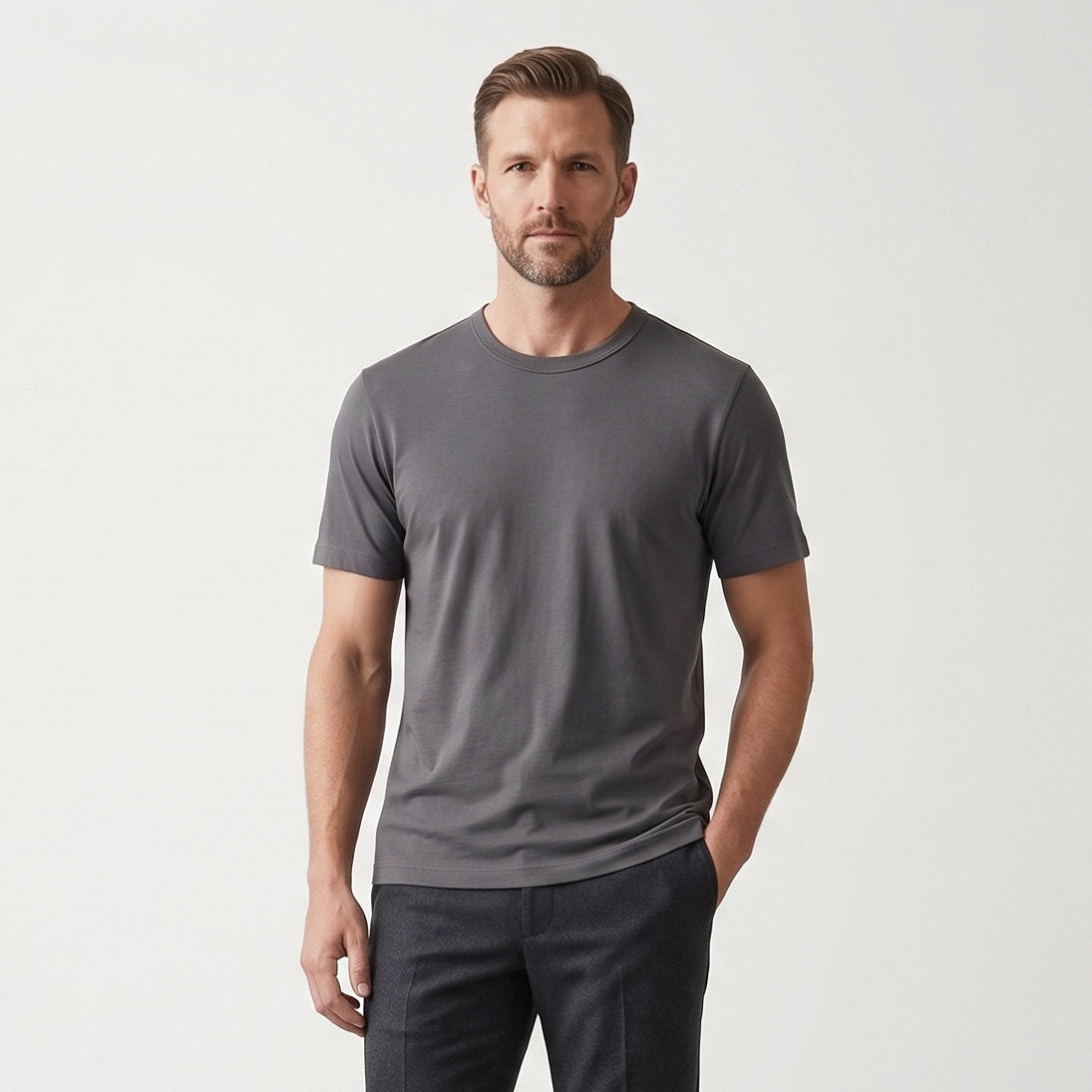Male model wearing Iron Gray Engineered Performance Tee, high-quality blank cotton t-shirt for custom print