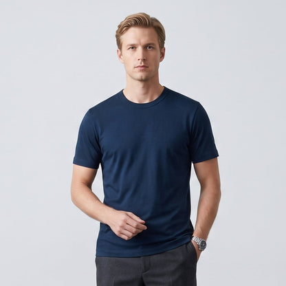 Male model wearing Navy Blue Engineered Performance Tee, high-quality blank cotton t-shirt for custom print