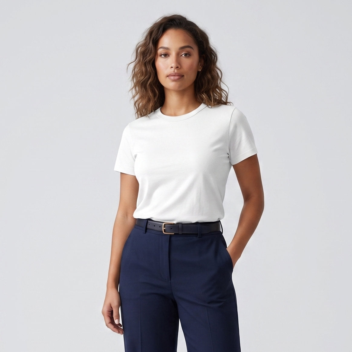 Female model wearing Optical White Engineered Performance Tee, high-quality blank cotton t-shirt for custom print
