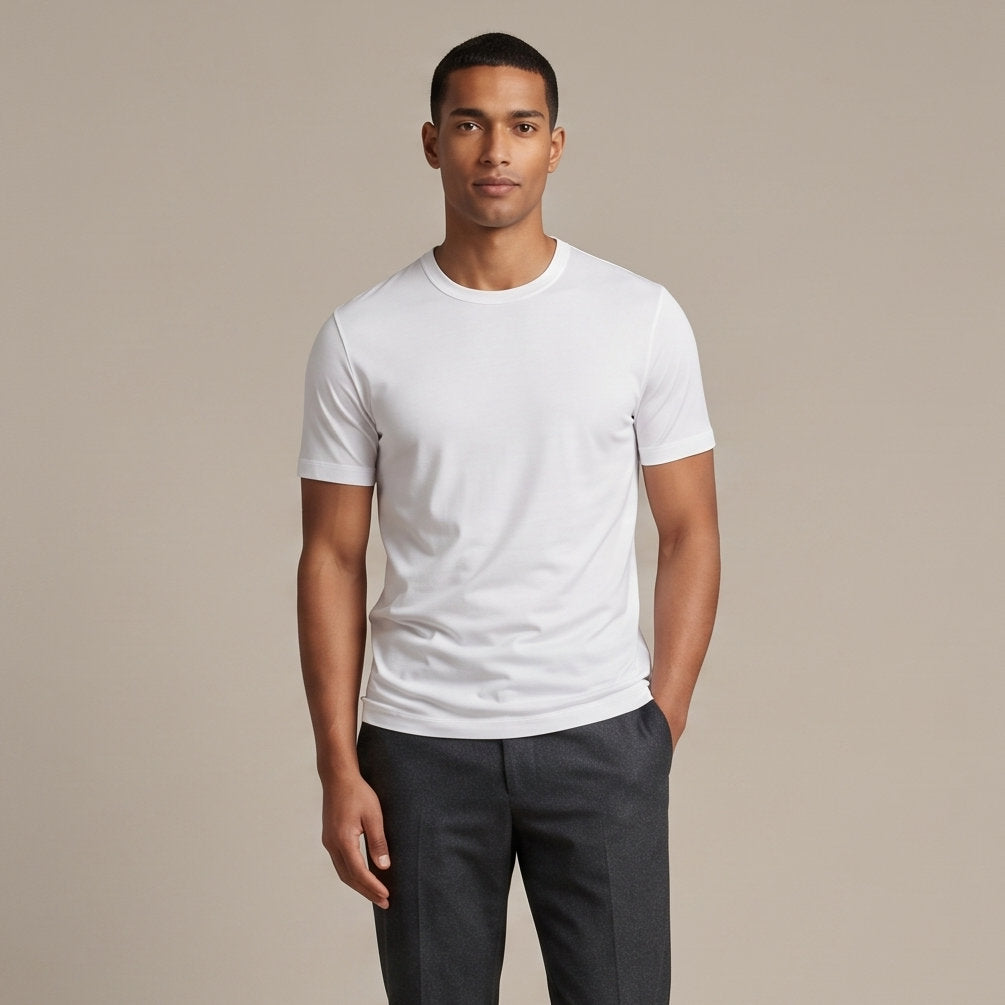 Male model wearing Optical White Engineered Performance Tee, high-quality blank cotton t-shirt for custom print