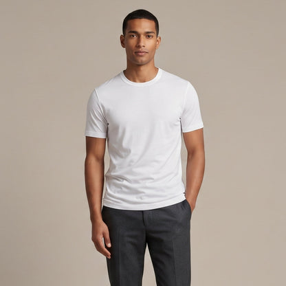 Male model wearing Optical White Engineered Performance Tee, high-quality blank cotton t-shirt for custom print