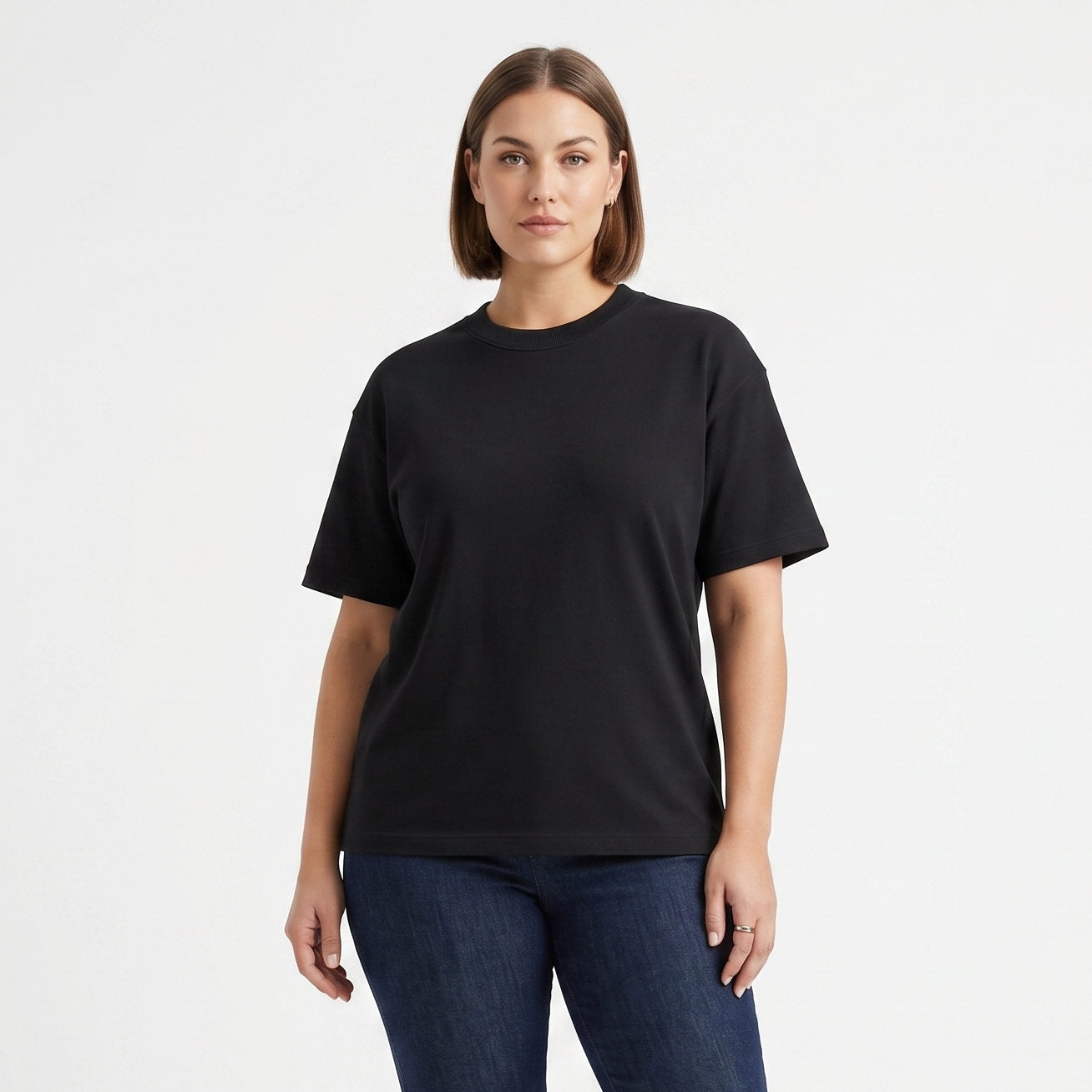 Female model wearing Obsidian Black Signature Heavyweight French Terry Tee, relaxed fit premium blank 100% cotton tee