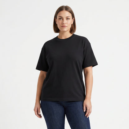 Female model wearing Obsidian Black Signature Heavyweight French Terry Tee, relaxed fit premium blank 100% cotton tee