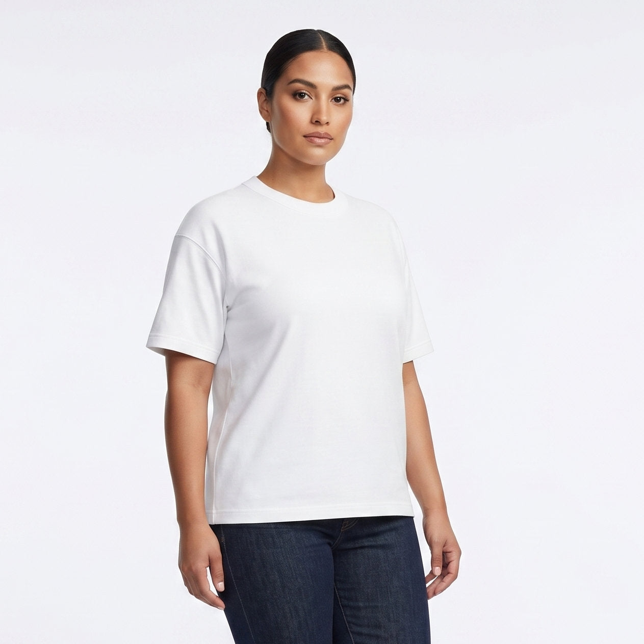 Female model wearing Optical White Signature Heavyweight French Terry Tee, relaxed fit premium blank 100% cotton tee